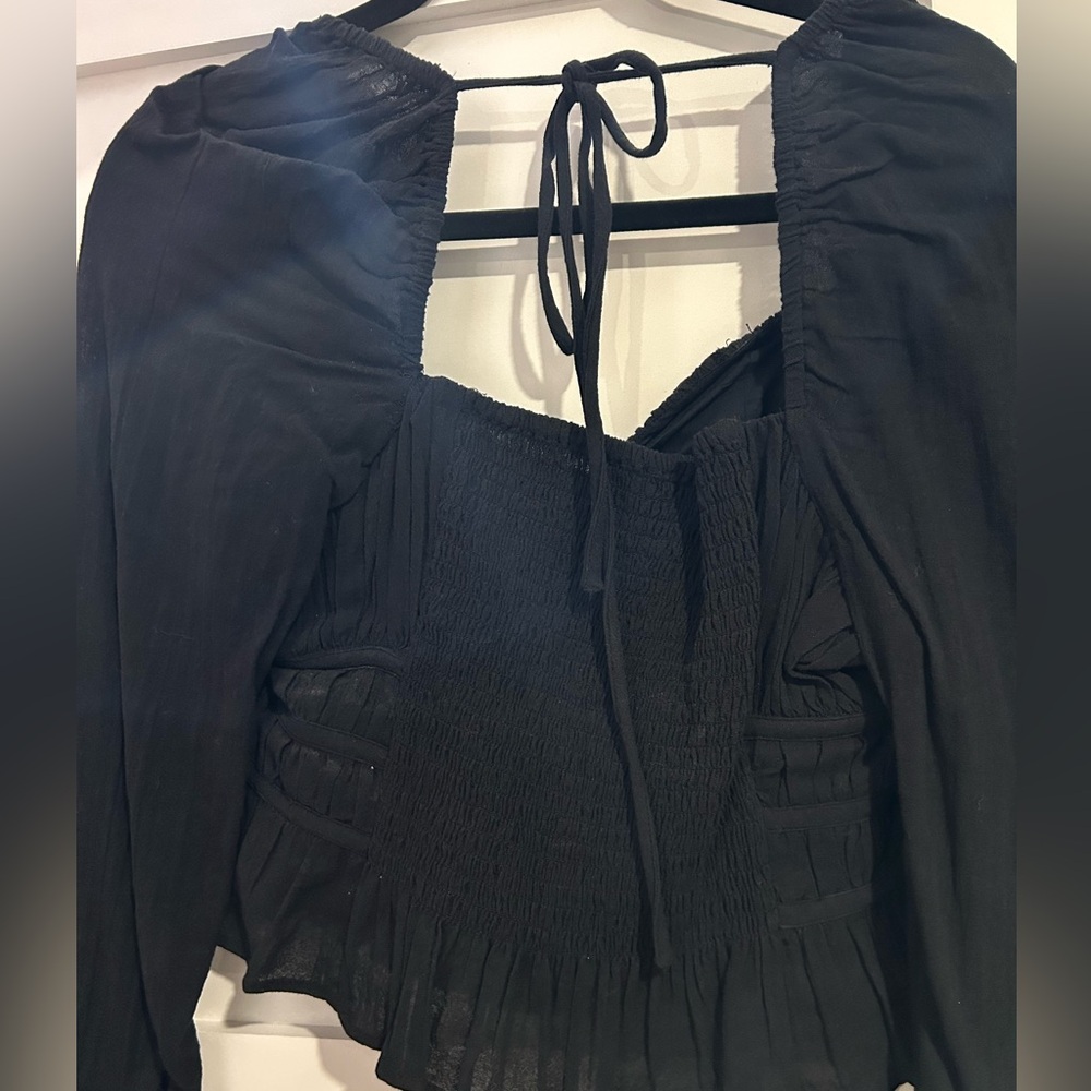 Black tie back Free people corset like top.